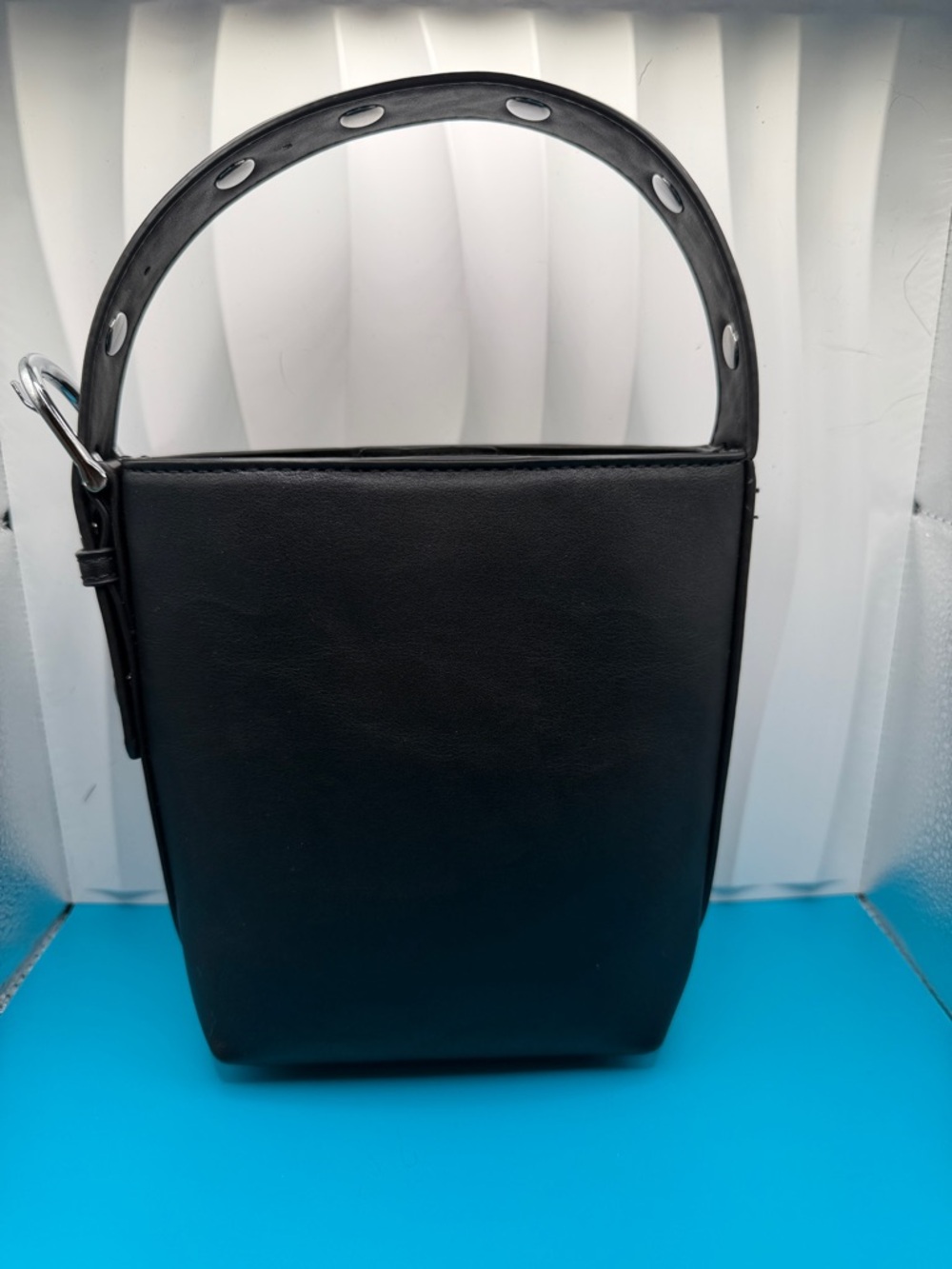 Madison West Sleek Black Structured Mini Handbag